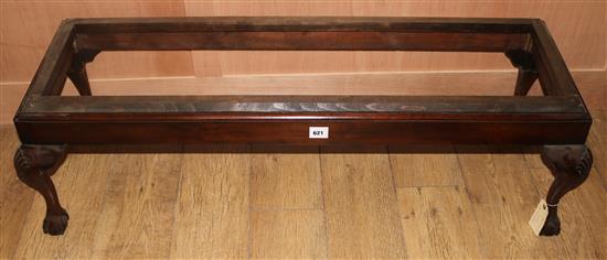 A mahogany cabriole leg fender stool